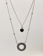 trendy silver circle pendant necklace with double chains and black stone detail, TikTok viral necklaces clean girl jewelry 2025