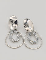 silver drop shaped dangly earrings with baguette crystals, clean girl jewellery 2024 trending style