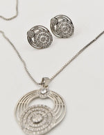 dainty silver leaf circle pendant necklace Canada with matching studs, layering necklaces for women from Montreal jewellery brand