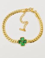 golden_leaf_heart_charm_bracelet_on_white_background