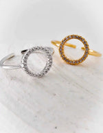 Engagement ring flat lay with clean white background