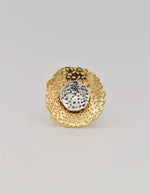 Close-up of handcrafted petal details on engagement ring