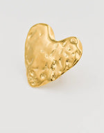 Artistic abstract heart ring styled with minimalist cuff