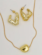 luxury gold necklace and earrings set with modern molten design, Montreal minimalist jewelry for women