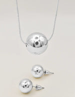 silver radiant orb duo necklace with circle pendant and matching studs montreal minimalist jewelry clean girl jewelry 2025