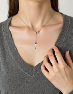 Silver locket necklace with interlocked square pendants