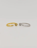 Gold and silver sparkle promise rings set side by side