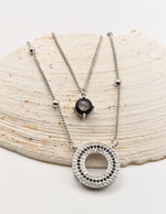 silver double layer circle pendant necklace with black gemstone accent, trending layering necklaces for women Canada