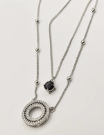 silver circle pendant necklace Canada featuring halo design with black accents, ideal layering necklaces for women