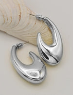 silver modern wave hoop earrings canada tiktok trending minimalist jewelry montreal style