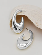 montreal inspired silver wave design hoop earrings canada chic clean girl jewelry 2025