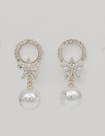 canadian earrings with pearl drops and crystal flower design trending bridal jewellery