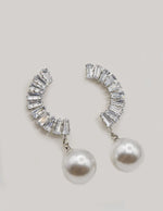 crystal_pearl_arc_ear_wings displayed flat showing arc shape and pearl detail