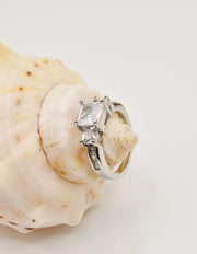 princess_cut_engagement_ring with side stones montreal minimalist style