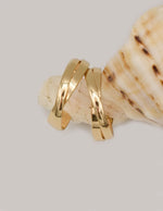 golden_glow_twist_dangles elegant montreal minimalist gold earrings for women