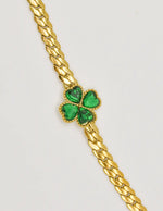 golden_leaf_heart_charm_bracelet_styled_for_evening_wear

