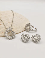 luxe leaf swirl sparkle set featuring circle pendant necklace canada, silver ring and earrings, clean girl jewelry 2025