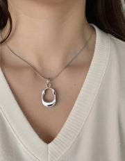 Canadian peoples jewelry silver necklace closeup

