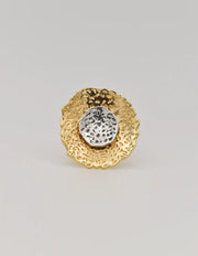 Close-up of handcrafted petal details on engagement ring