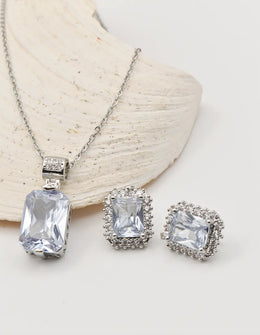 radiant_glamour_silver_set elegant silver necklace with emerald cut pendant and matching stud earrings, fine jewelry near me Canada