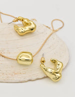 trendy gold jewellery set with organic hoop earrings and dainty necklace, clean girl jewelry 2025 Canada
