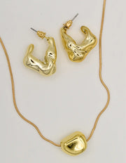 luxury gold necklace and earrings set with modern molten design, Montreal minimalist jewelry for women