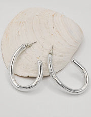 silver_oval_shiny_hoops_earrings_for_women_minimalist_jewelry_montreal_canada