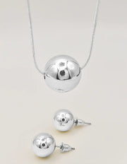 silver radiant orb duo necklace with circle pendant and matching studs montreal minimalist jewelry clean girl jewelry 2025