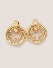 gold earrings women featuring layered circular hoops, montreal minimalist jewelry for everyday wear