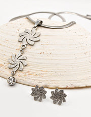 minimalist silver swirl pendant necklace and stud earring set montreal jewellery store