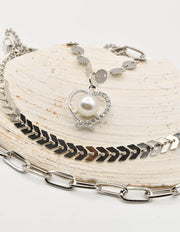 sparkle pearl christmas necklace featuring heart pendant and layered silver chain set – montreal minimalist jewelry and tiktok viral necklaces