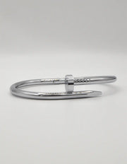 Polished silver steel twist nail bracelet, trending unisex Canadian jewellery design.