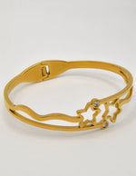 stellar_twinkle_golden_bracelet_for_women_modern_star_shaped_gold_bracelet_with_sparkling_gemstones_gift_for_her_canada