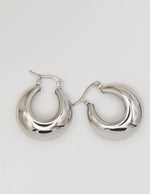 Side view of polished sterling silver earrings